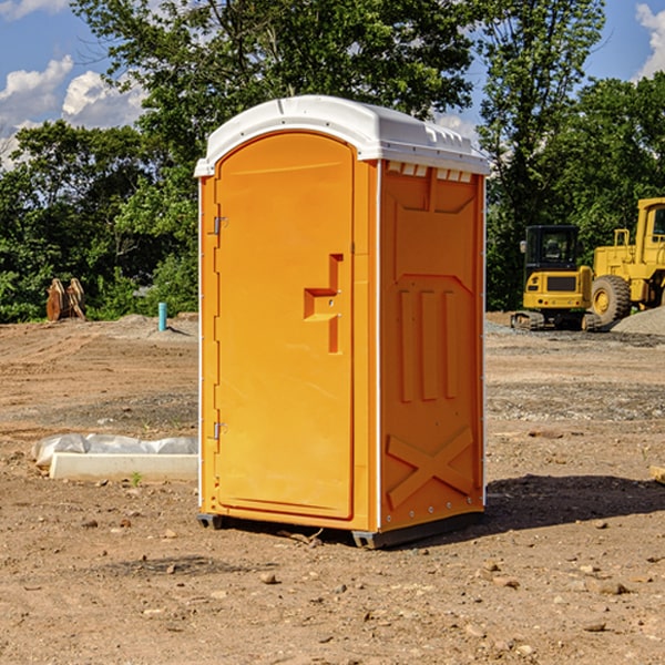 how often are the portable restrooms cleaned and serviced during a rental period in Byron